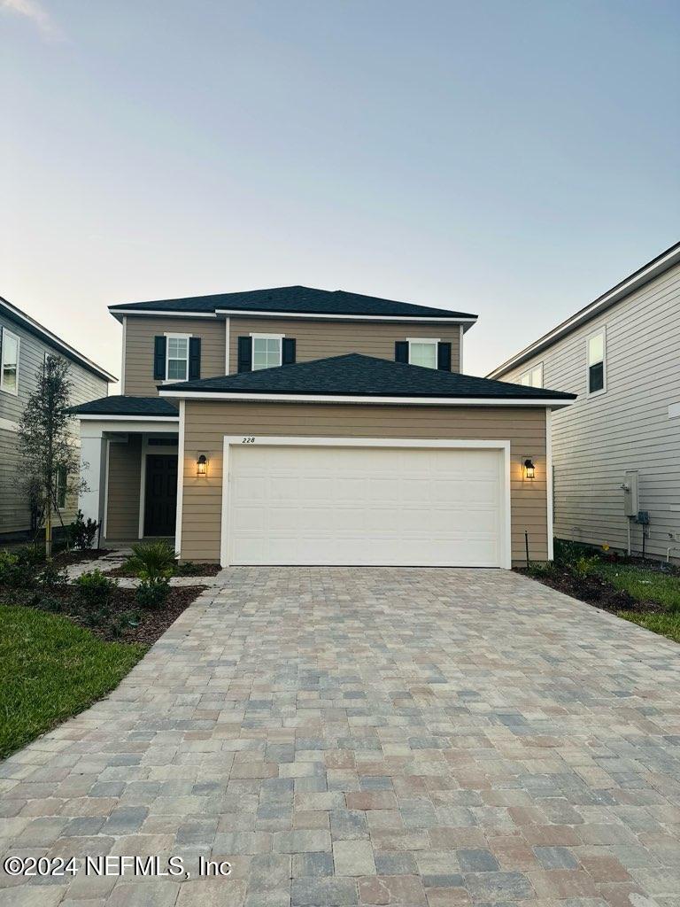 a front view of house with yard