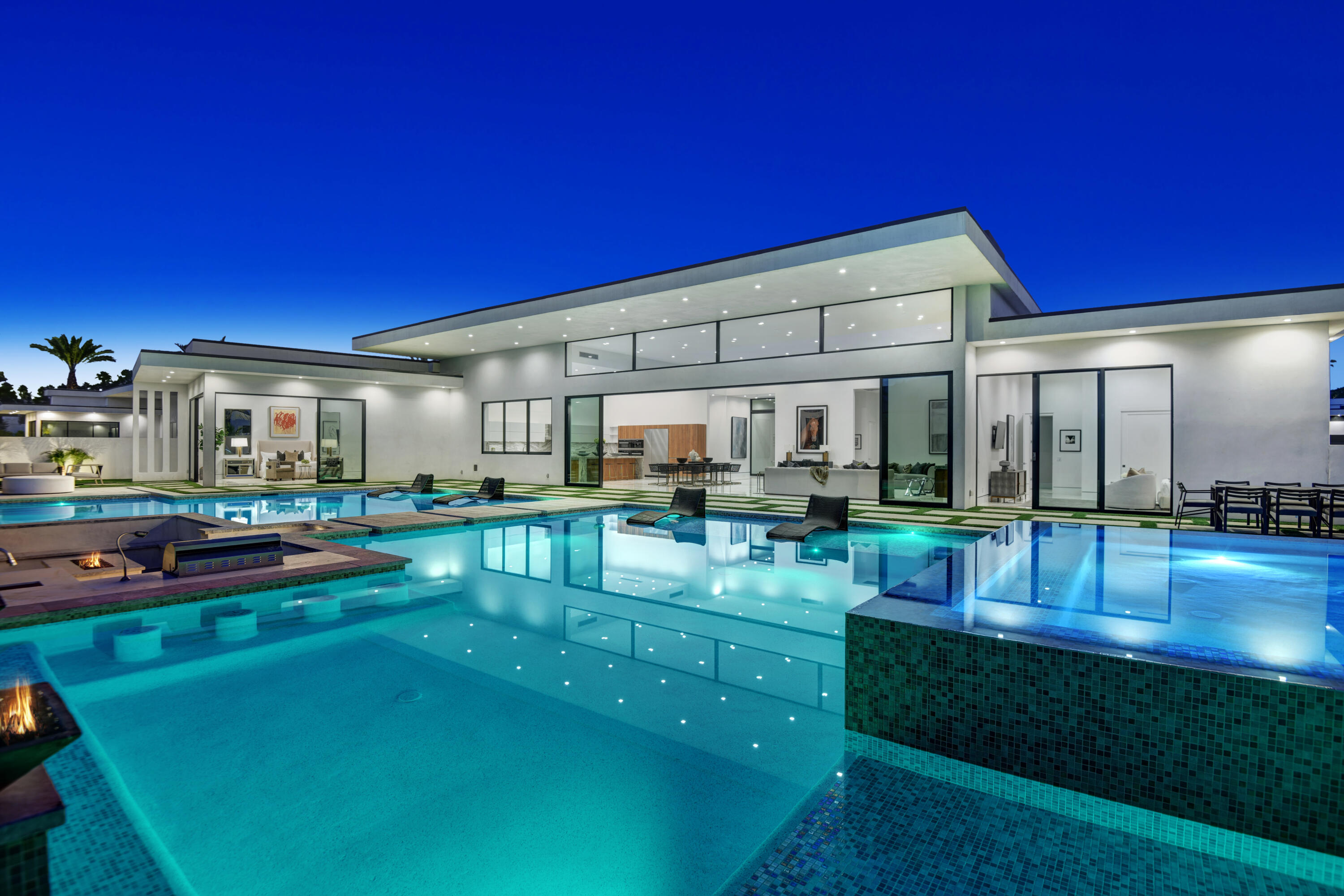 a view of house with backyard outdoor seating area and furniture