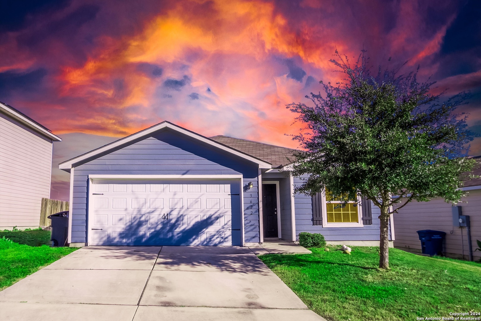 front view of a house with a yard