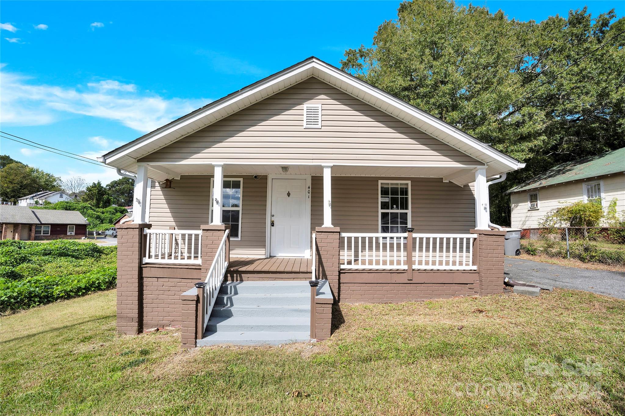 a front view of a house with a porch