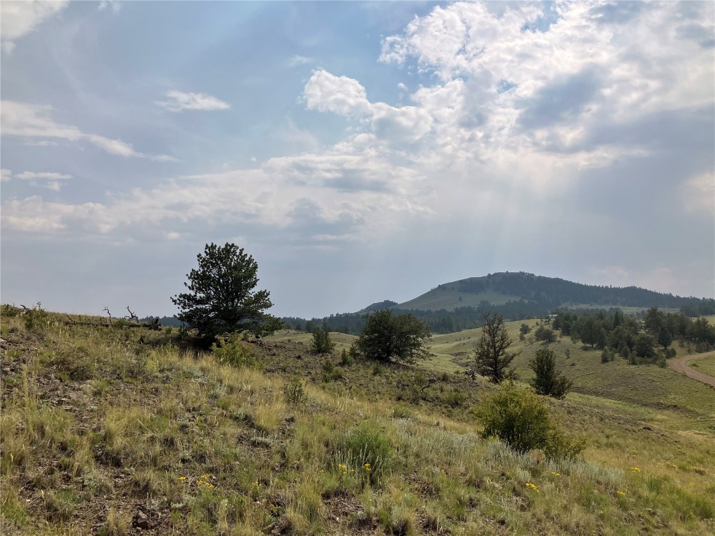 a view of mountains and valleys