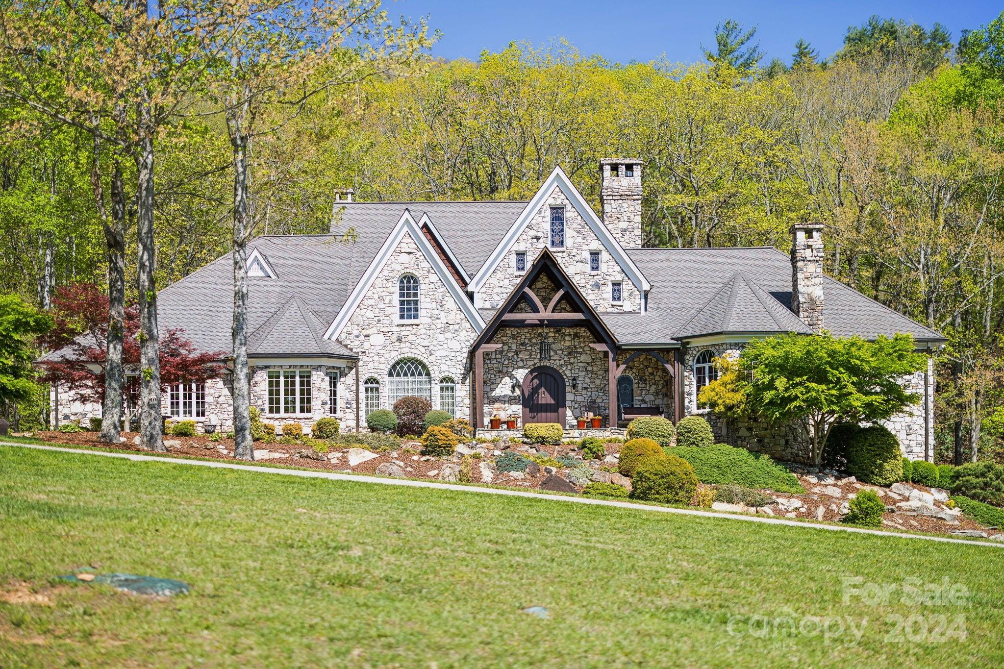 a aerial view of a house with a garden and plants