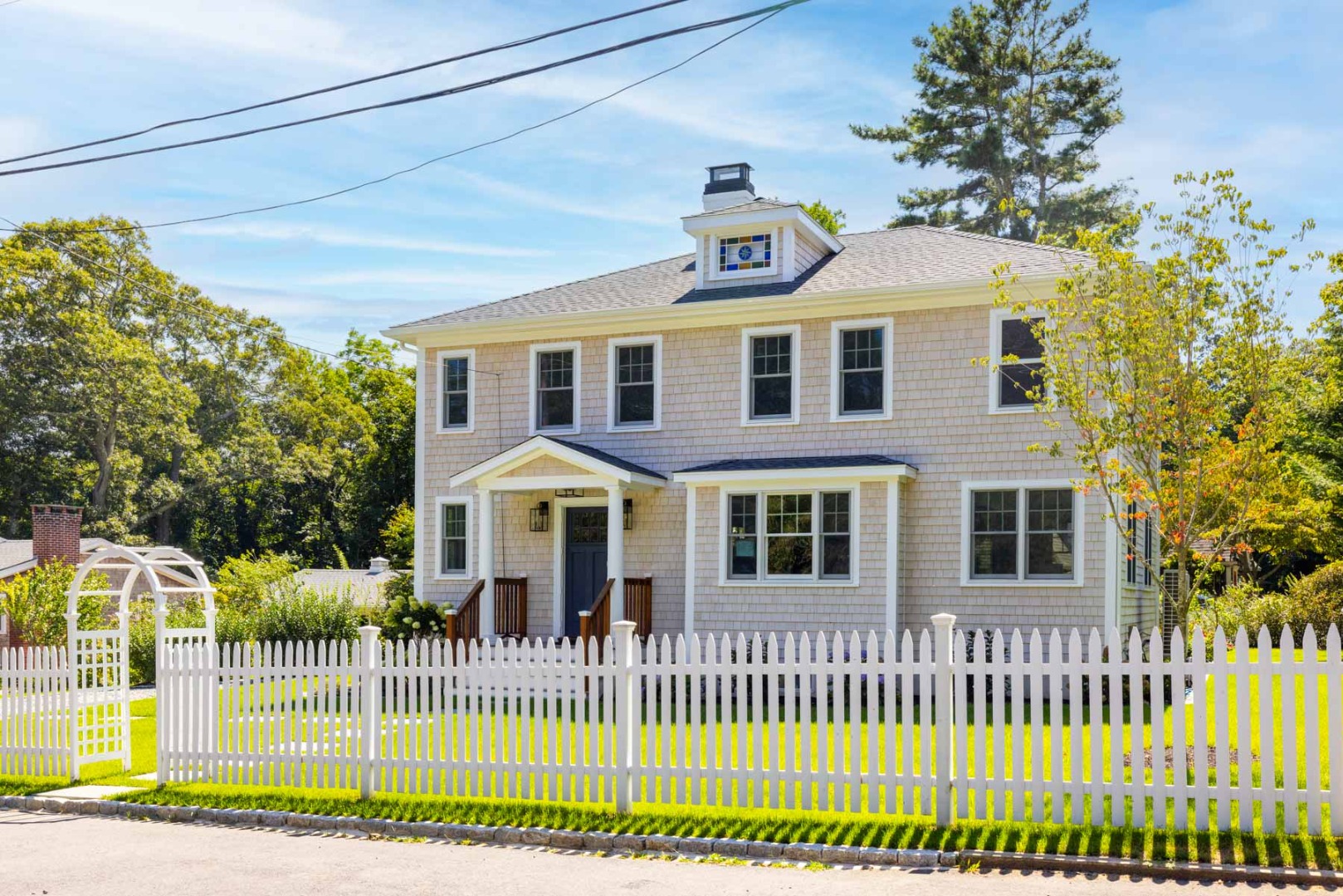 a front view of a house with a porch