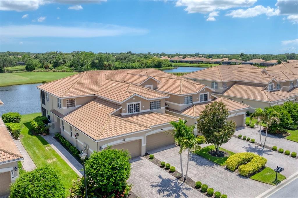 an aerial view of a house with a garden