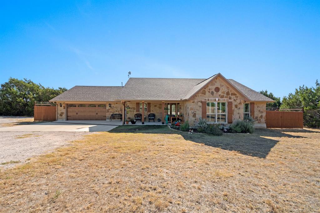 a front view of a house with yard