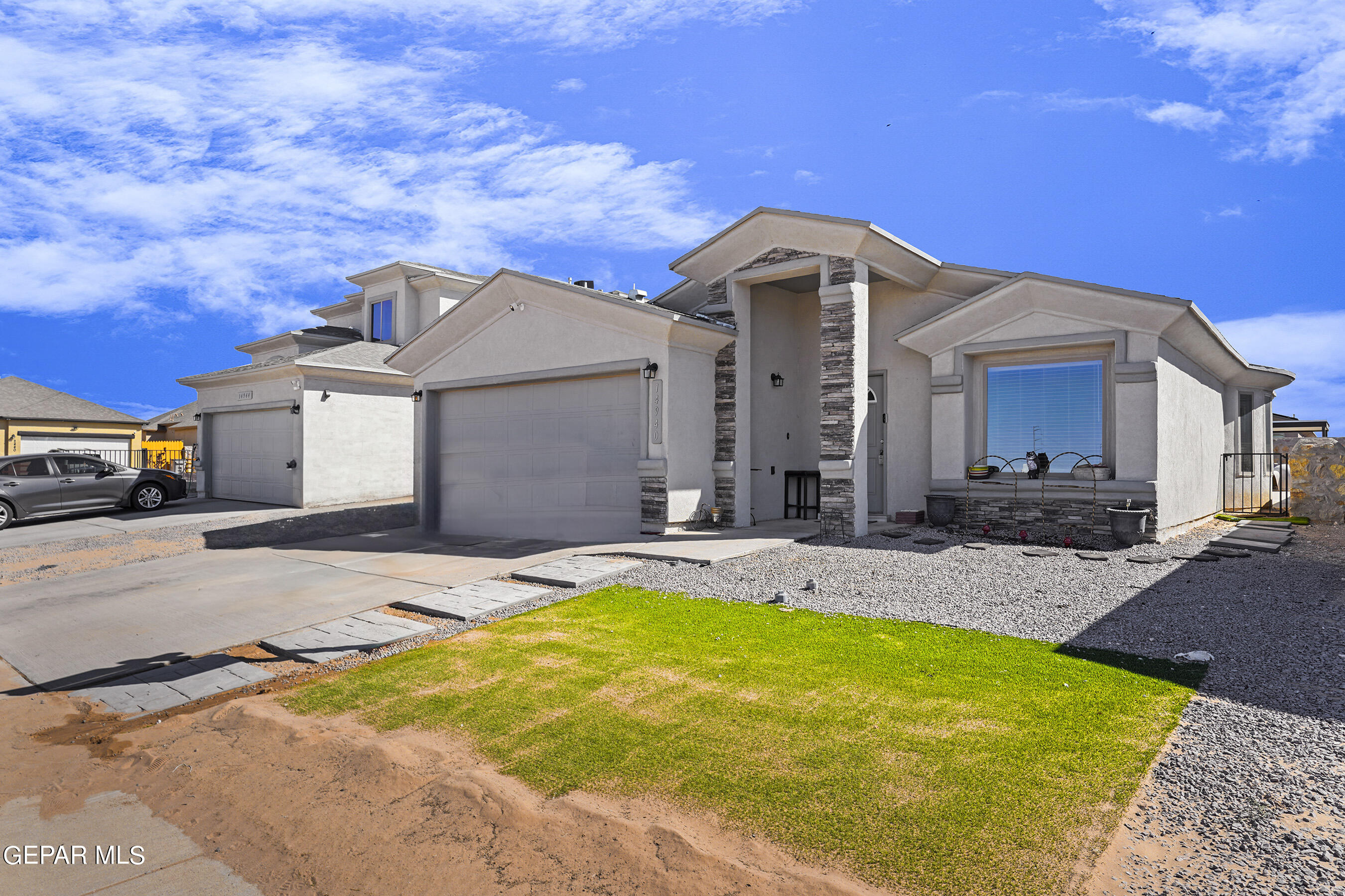 a front view of a house with swimming pool