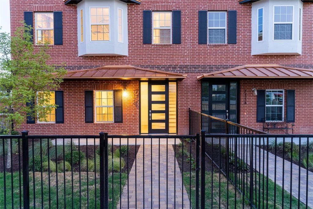 a view of a brick building from a balcony