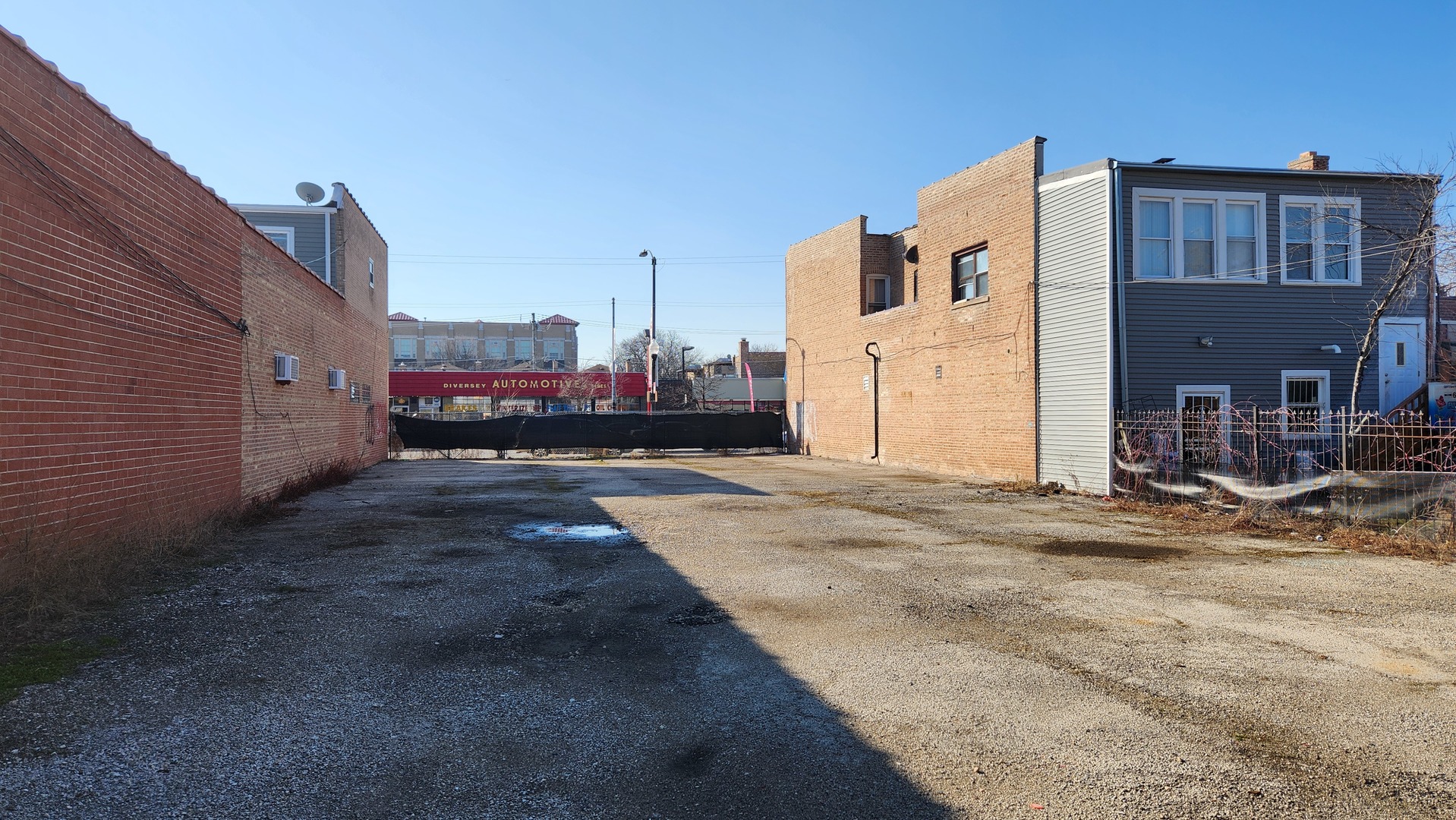 a view of a street in front of a building