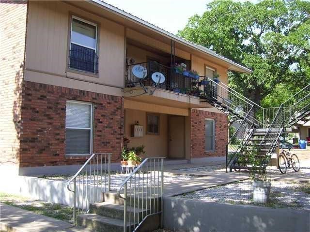 a front view of a house with garage