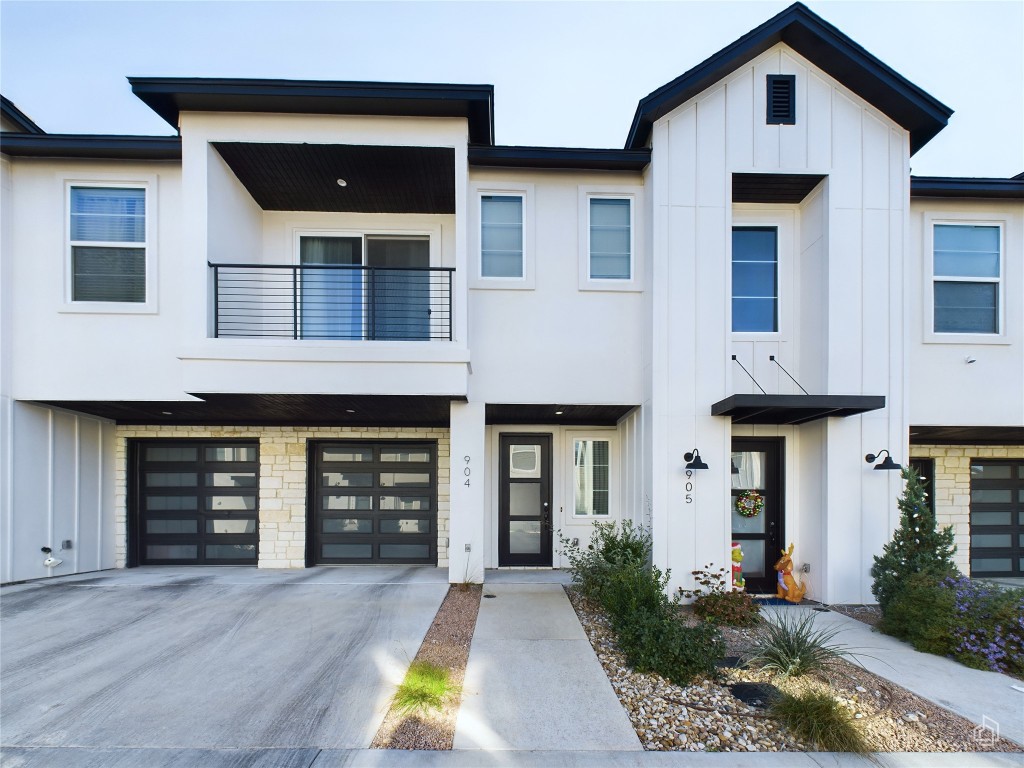 a front view of a house with yard