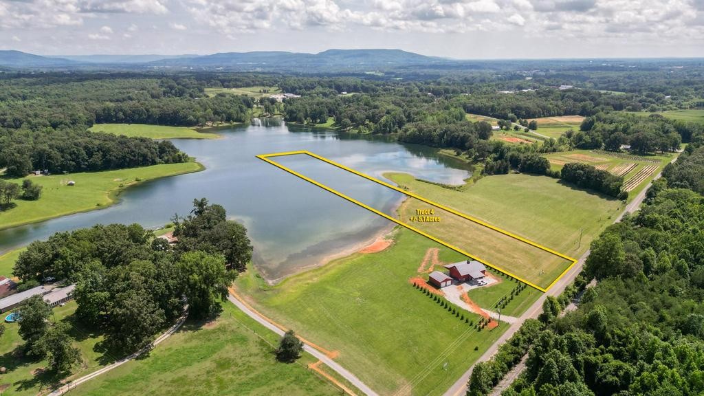 an aerial view of a golf course with chairs