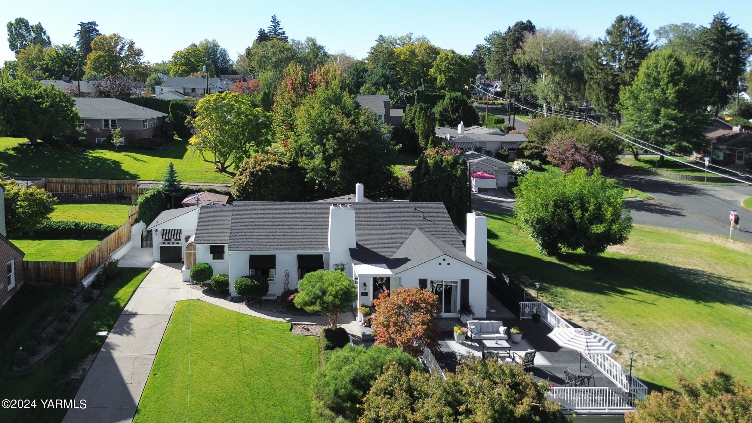 an aerial view of a house with a garden