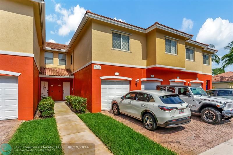 a car parked in front of a house