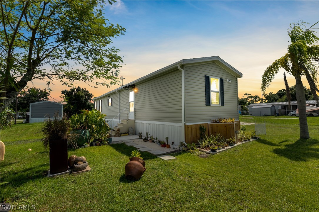 front view of a house with a yard