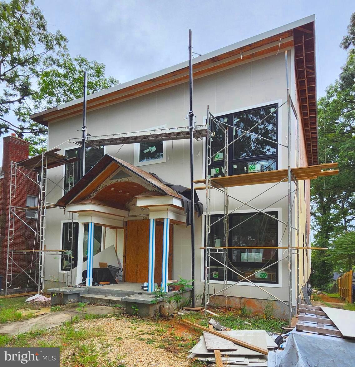 a front view of a house with swimming pool