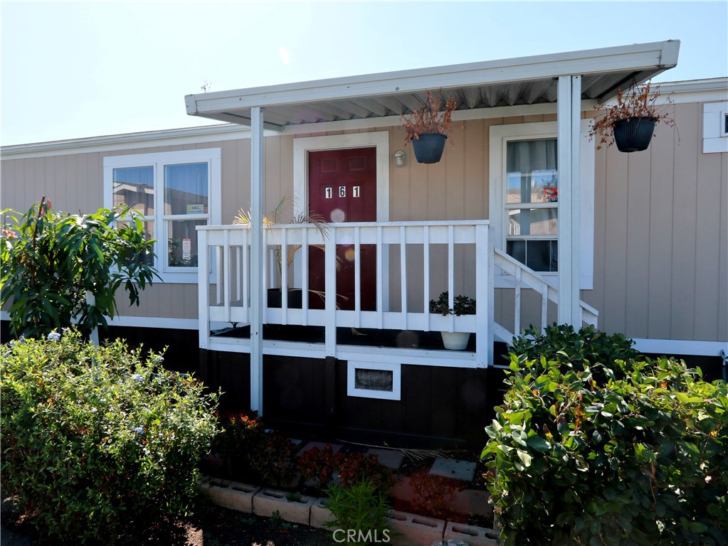 front view of a house with a small yard