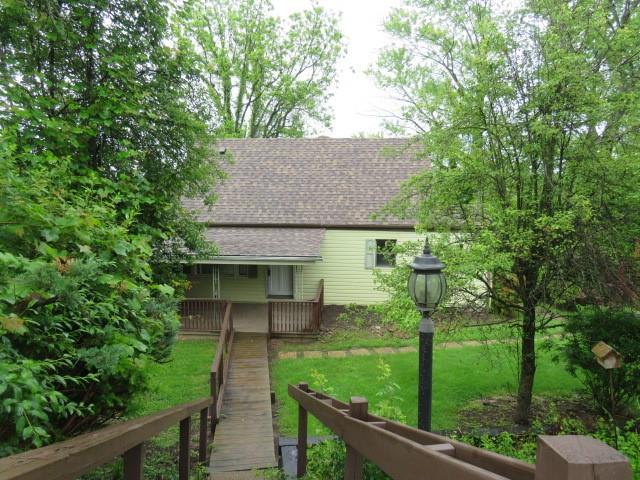 a house view with a garden space