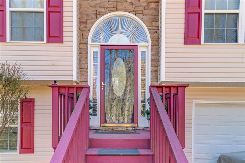 a front view of a house with a staircase