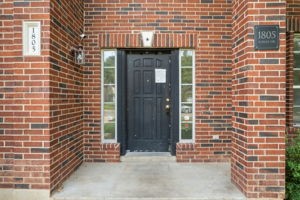 a front view of a building with a door