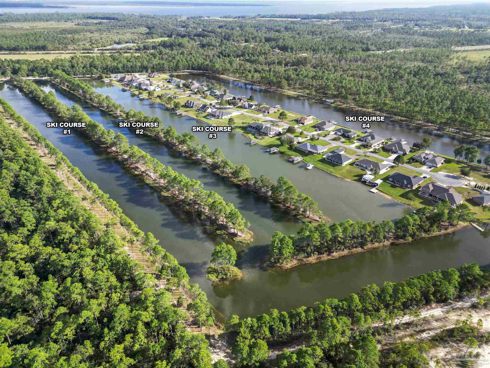 an aerial view of lake residential house with outdoor space