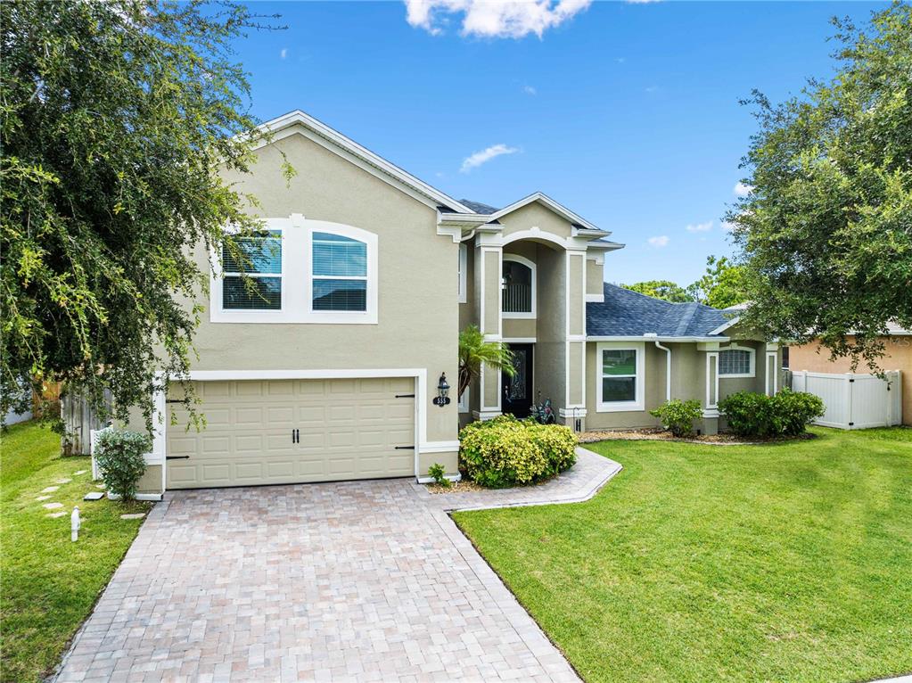 front view of house with a yard