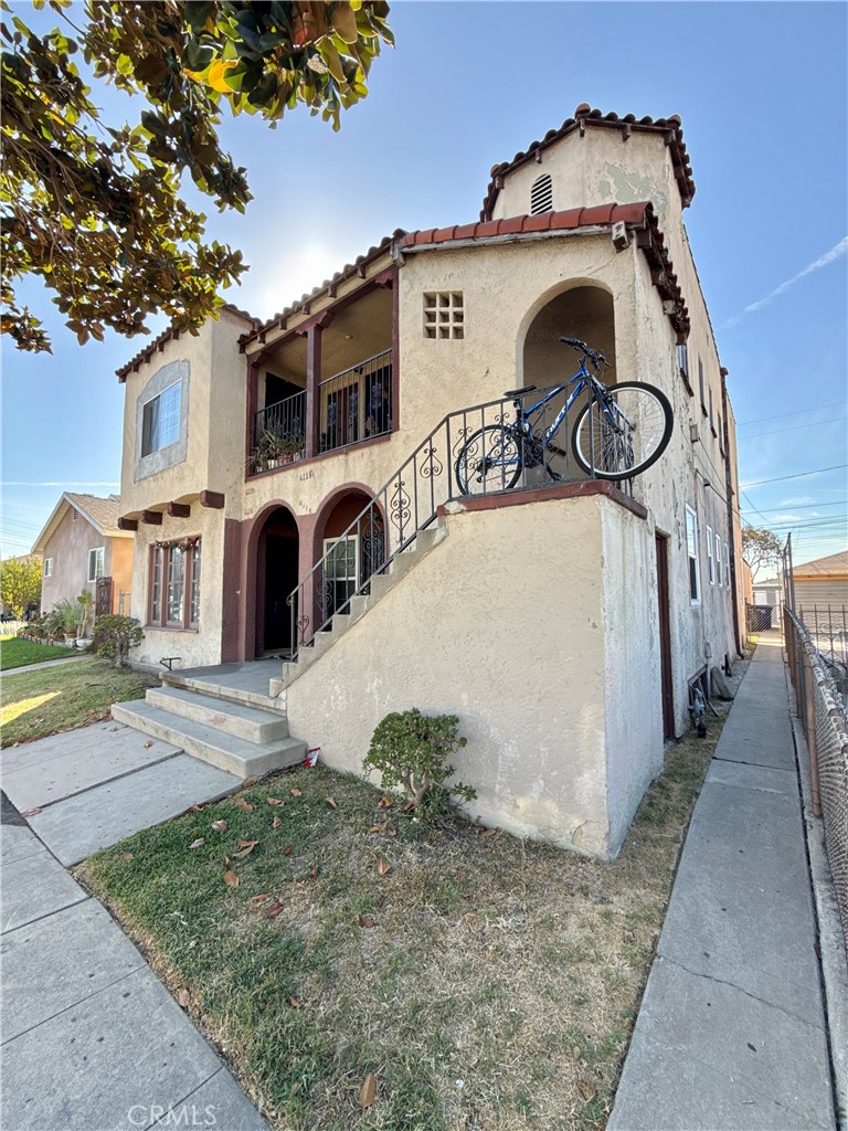 a view of a front of a house with a garage