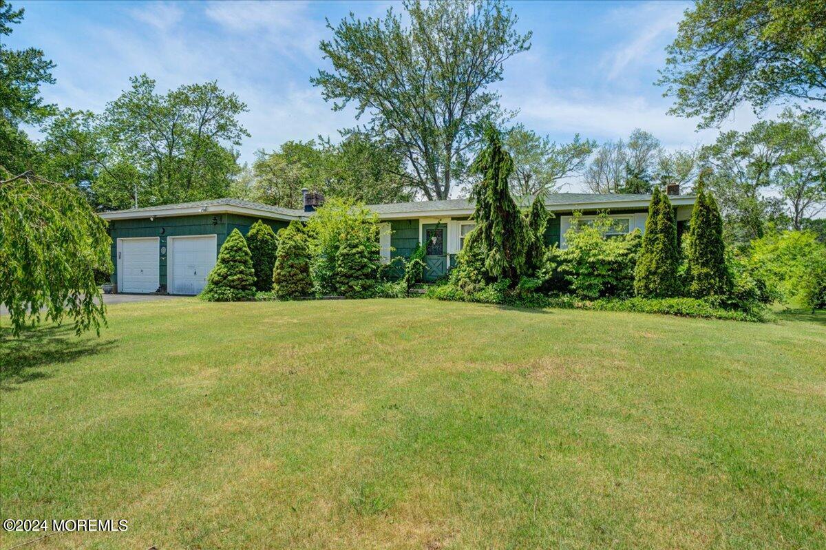 front view of house with a yard