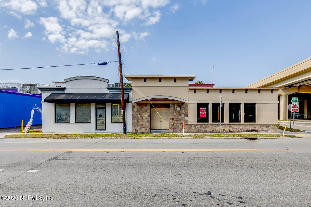 a view of a building with a street