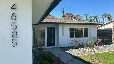 a view of a entryway door front of house