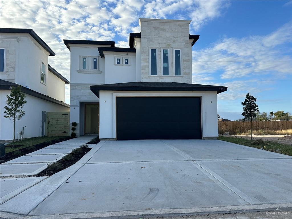 front view of a house with a garage