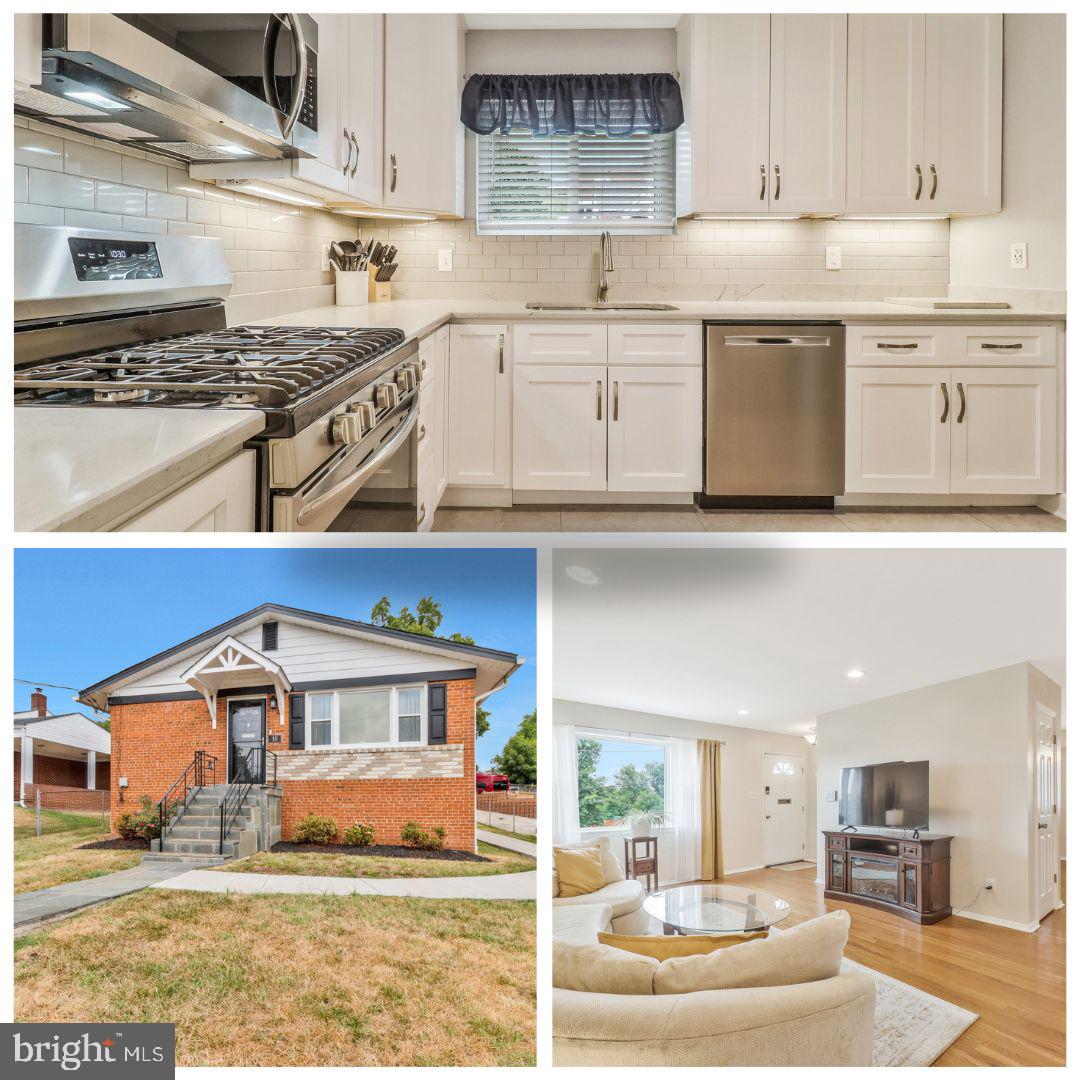 a kitchen with stainless steel appliances granite countertop a stove and white cabinets