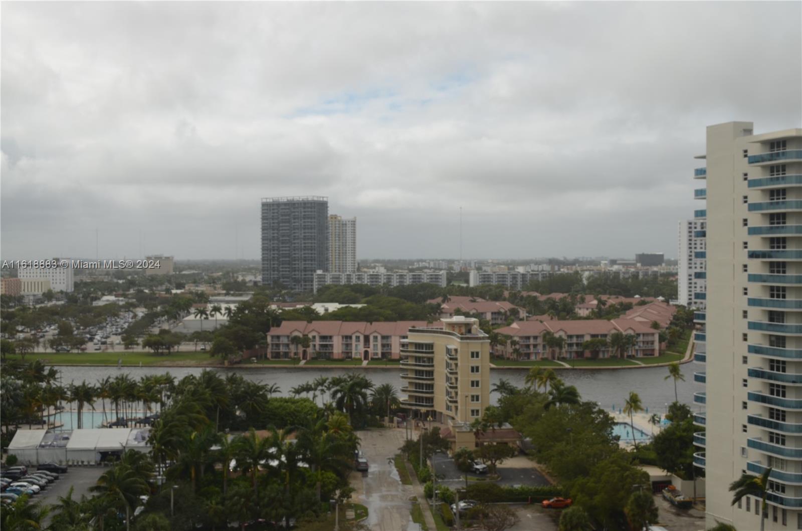 a view of a city with tall buildings