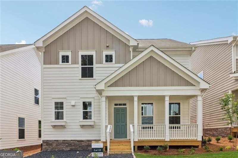 View of front facade featuring covered porch