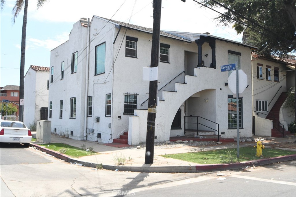 a view of a street with building