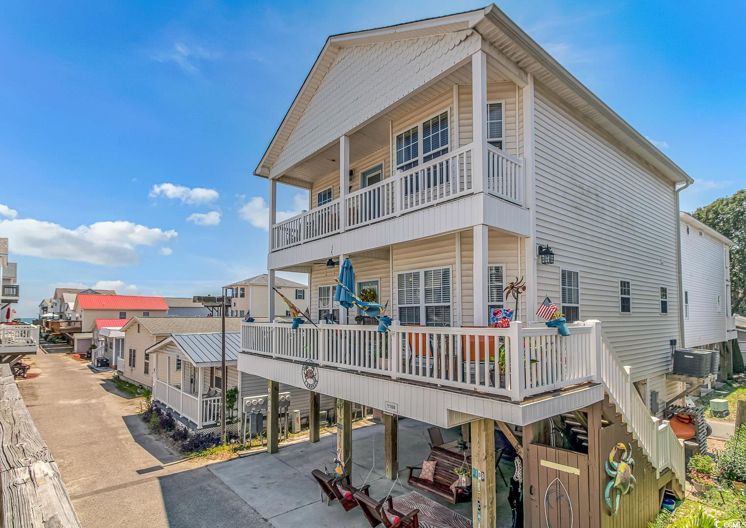 Exterior space featuring a carport, central AC, an