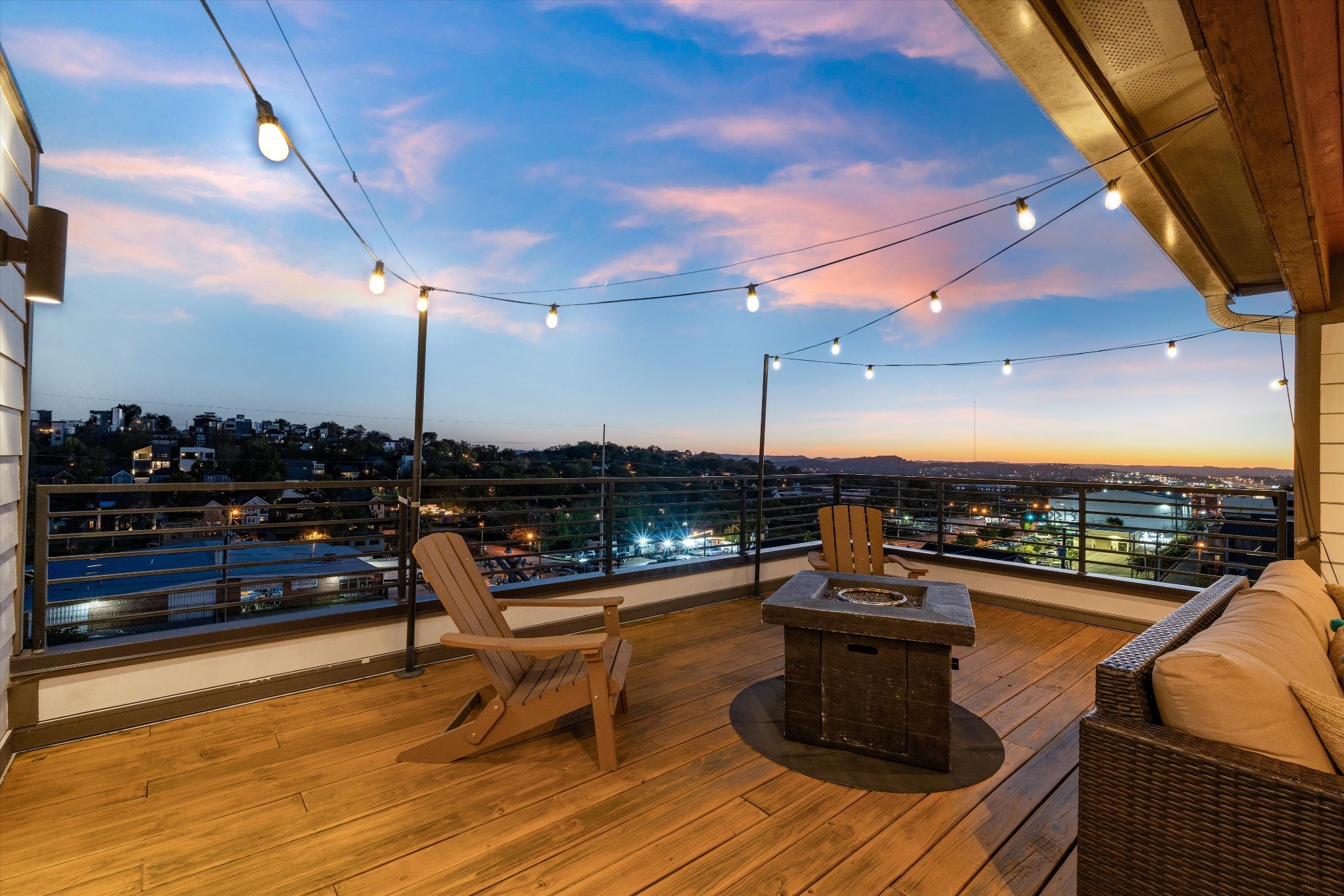 Gorgeous sunset views of the western hills from the top deck, where you'll also find a covered lounge/tv area that's perfect for movie night.