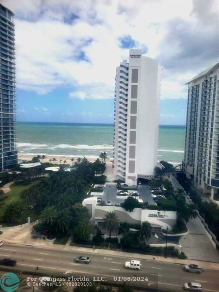 a view of a city with tall buildings