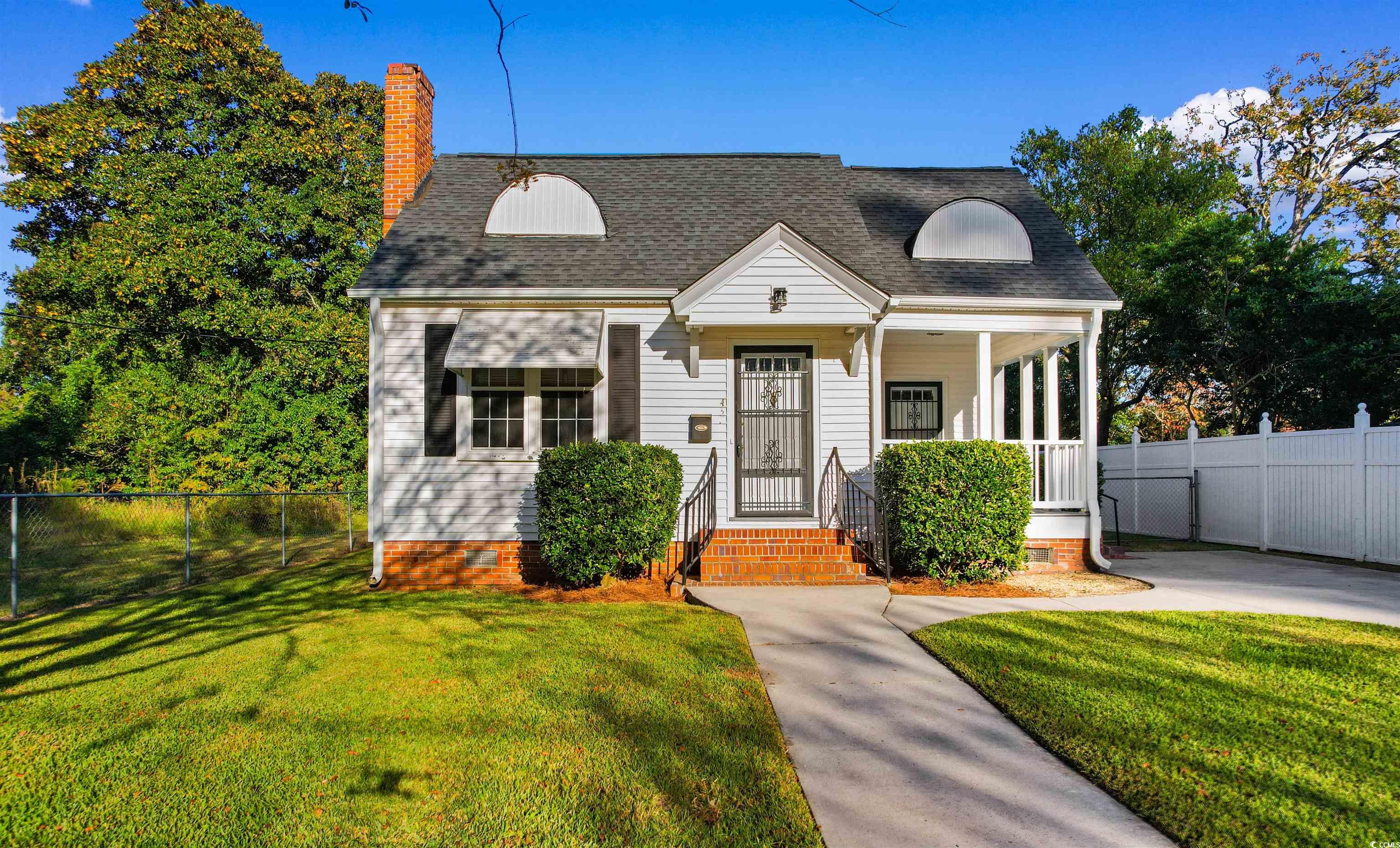 View of front of home with a front yard