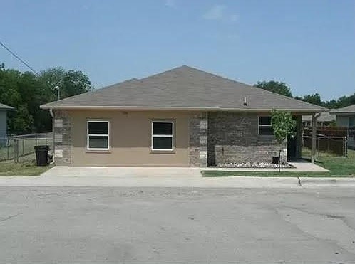 front view of a house with a outdoor space