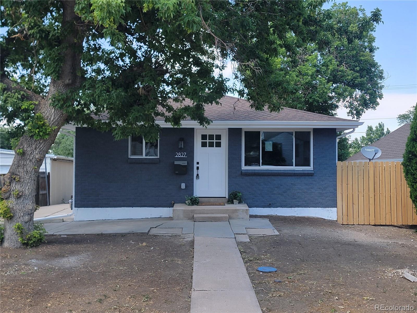 a front view of a house with a garage