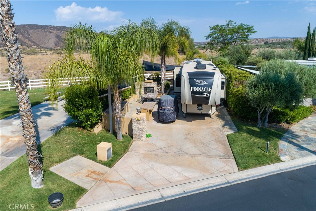 an aerial view of a house with garden view