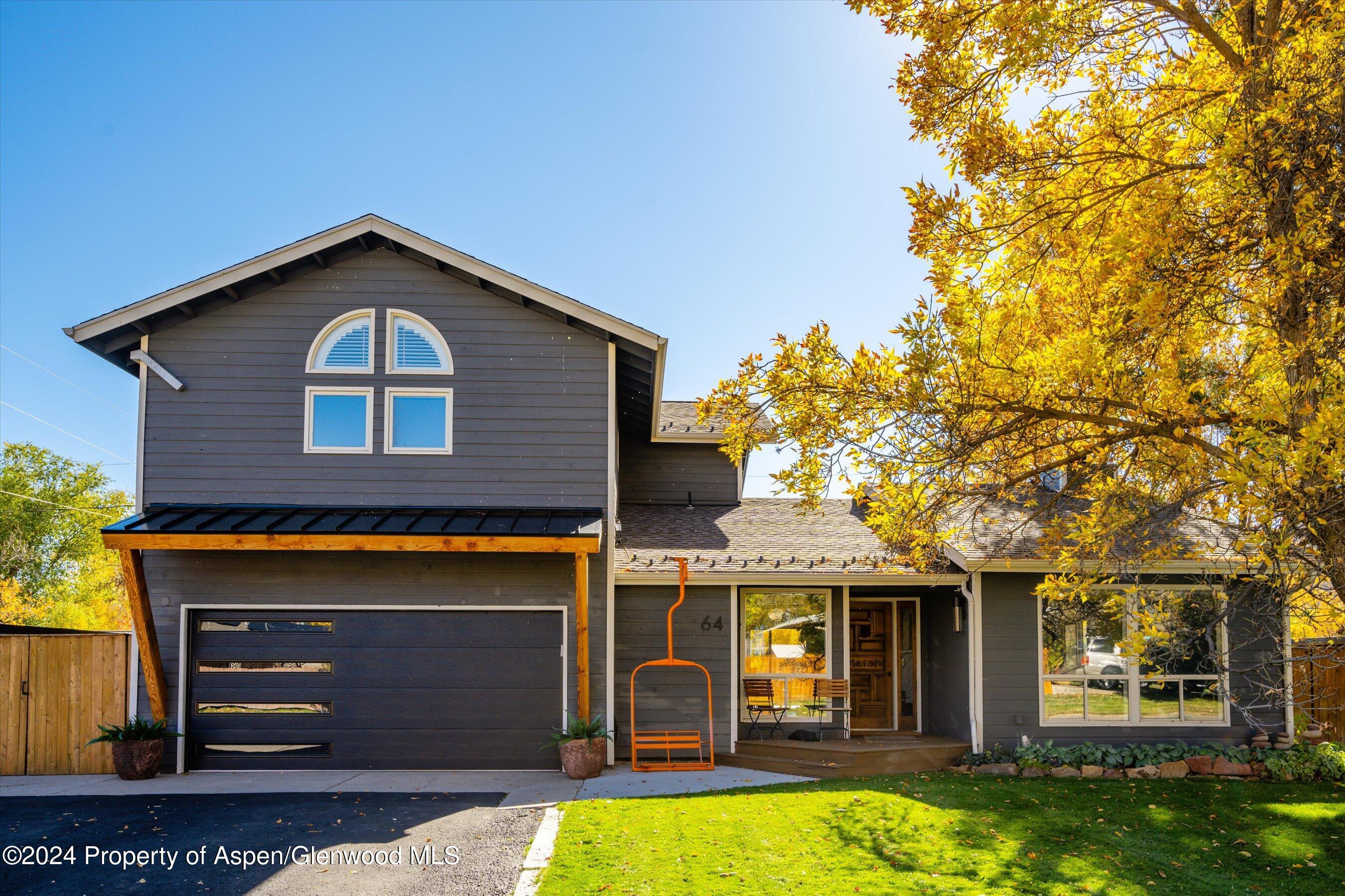 a front view of a house with yard