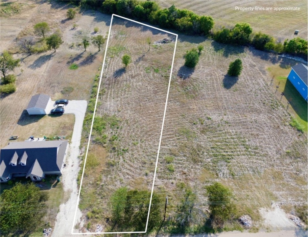 a aerial view of a house with a lake view