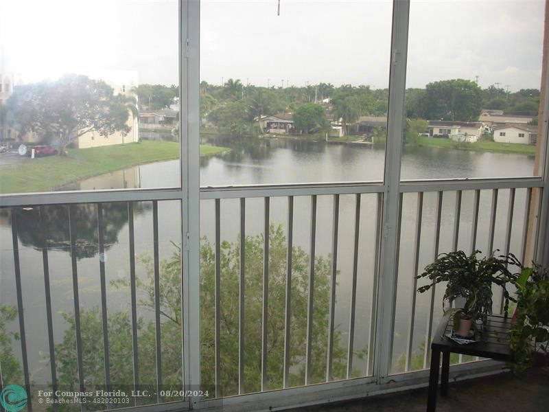 a view of a balcony with an outdoor space