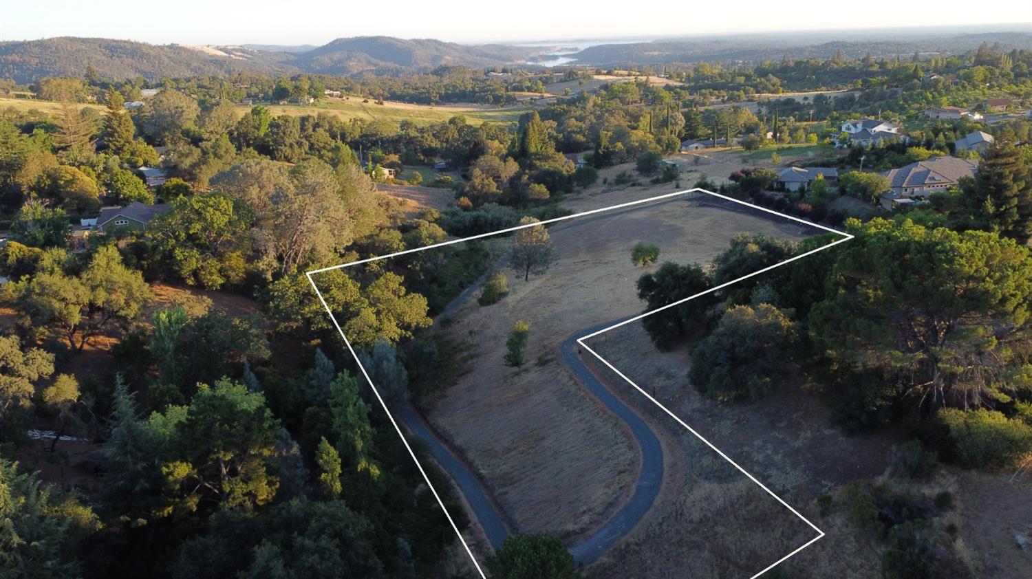 an aerial view of residential house with outdoor space