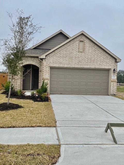 a front view of house with garage