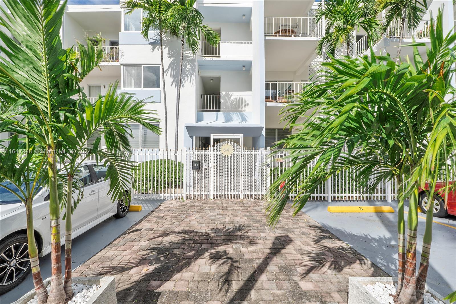 a view of house with outdoor space and swimming pool