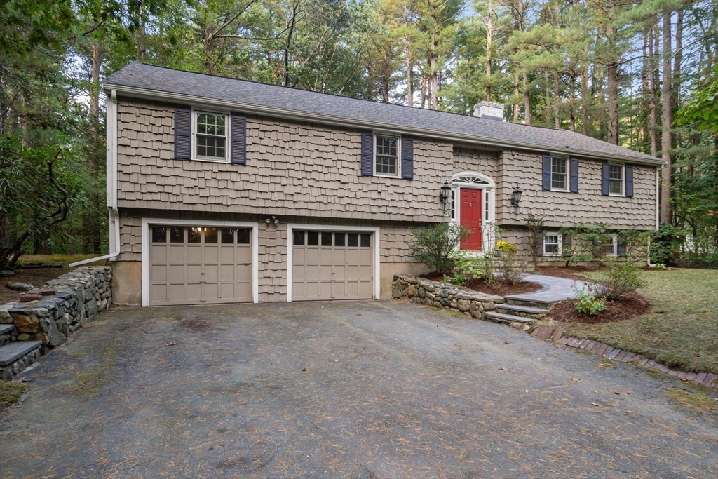 front view of a house with a small yard