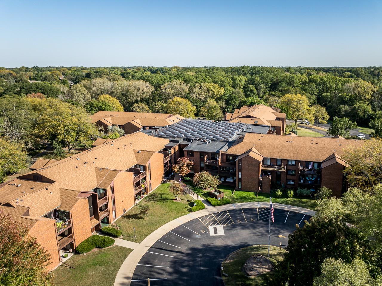 an aerial view of a house with a garden