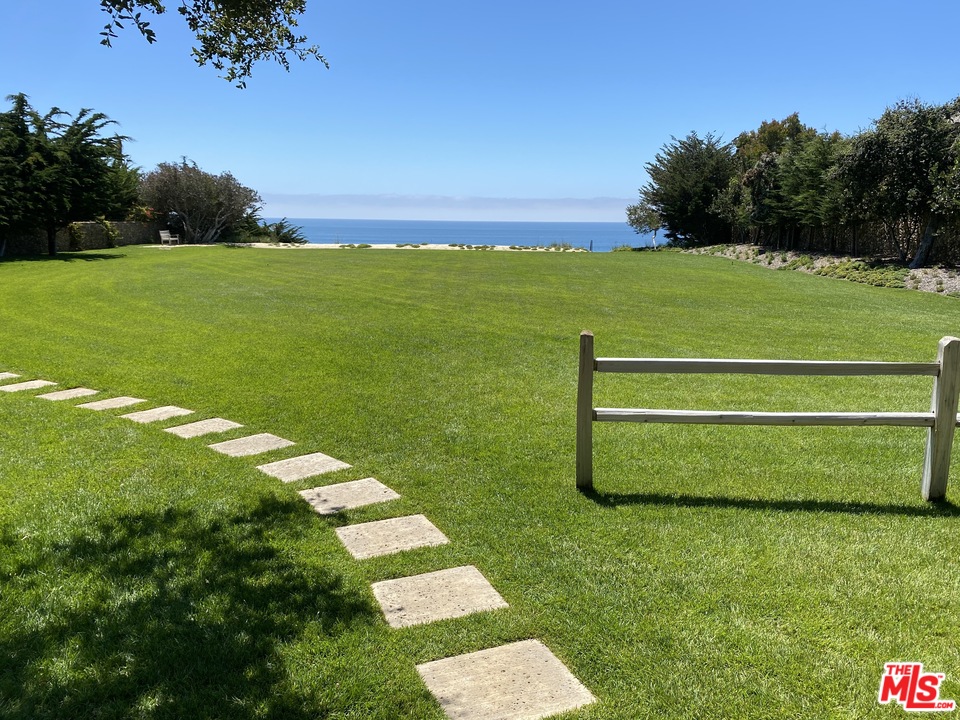 a view of a golf course with a garden